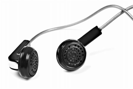 simsearch:400-04838289,k - a Pair of black earphones on a pure white background with space for text Stock Photo - Budget Royalty-Free & Subscription, Code: 400-04329877