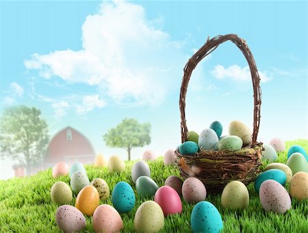 Colorful easter eggs with basket  in field of grass with blue sky Foto de stock - Royalty-Free Super Valor e Assinatura, Número: 400-04321065