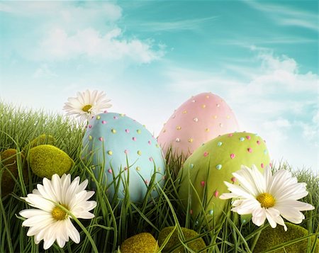 Three decorated easter eggs in the grass with daisies Foto de stock - Royalty-Free Super Valor e Assinatura, Número: 400-04321068