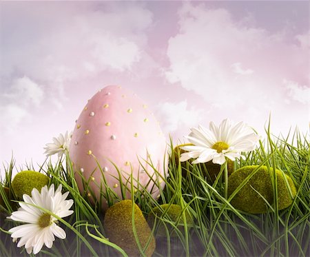 Large pink easter with flowers in tall grass with sky Foto de stock - Royalty-Free Super Valor e Assinatura, Número: 400-04321074
