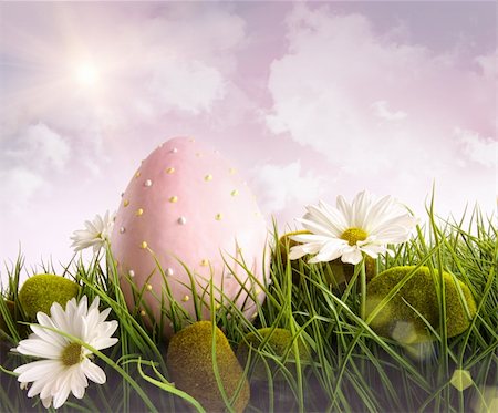 Large pink easter with flowers in tall grass with sky Foto de stock - Royalty-Free Super Valor e Assinatura, Número: 400-04321073