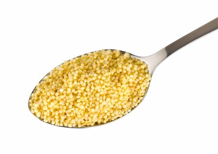 Millet in a spoon isolated on white background Foto de stock - Super Valor sin royalties y Suscripción, Código: 400-04321487