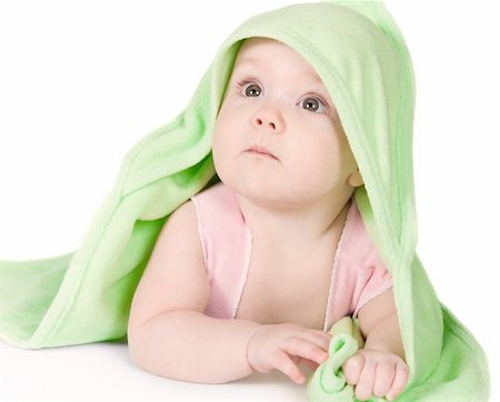 Cute baby with green towel  close up Foto de stock - Super Valor sin royalties y Suscripción, Código: 400-04321495