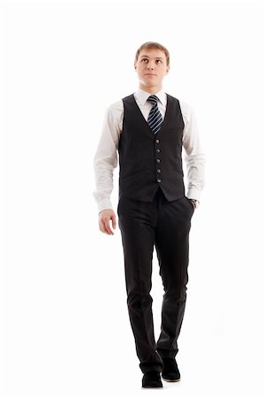 Young man walking. Isolated over white. Stock Photo - Budget Royalty-Free & Subscription, Code: 400-04321608