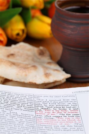 simsearch:400-04286012,k - Bible open to 1 Corinthians 11 with selective focus on the text about the Last Supper. Shallow dof Stock Photo - Budget Royalty-Free & Subscription, Code: 400-04321843