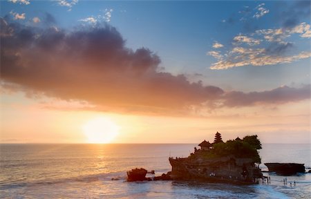 View to the Tanah Lot temple in sunset. Bali island, indonesia Stock Photo - Budget Royalty-Free & Subscription, Code: 400-04321971