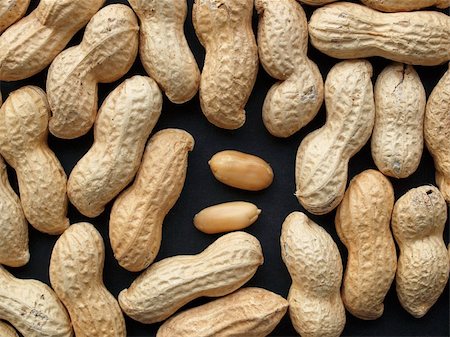 Peanut dry fruit or groundnut (Arachis hypogaea) beans - useful as a background Stock Photo - Budget Royalty-Free & Subscription, Code: 400-04322078