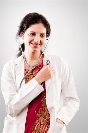 Indian beautiful Friendly lady doctor with stethoscope in sari Stock Photo - Budget Royalty-Free & Subscription, Code: 400-04322070