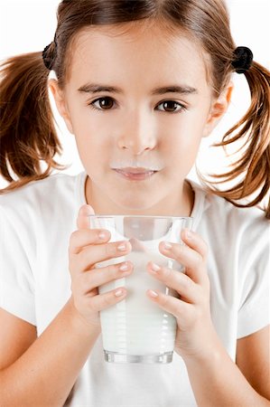 simsearch:400-04218582,k - Little girl with a milk moustache after drink a cup of milk Stockbilder - Microstock & Abonnement, Bildnummer: 400-04322215