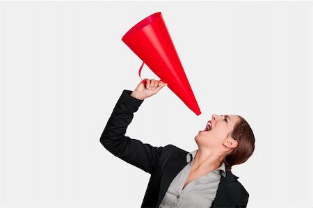 Business young woman speaking to a megaphone, isolated on white Stock Photo - Budget Royalty-Free & Subscription, Code: 400-04322257