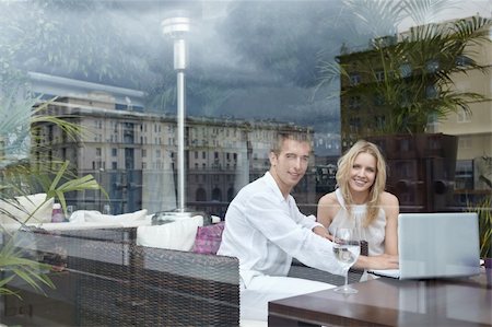 simsearch:400-04322314,k - A happy young couple in a restaurant in a glass Stock Photo - Budget Royalty-Free & Subscription, Code: 400-04322312