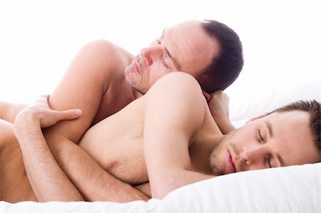 Happy homo couple in a white bed taking care of his boyfriend Stock Photo - Budget Royalty-Free & Subscription, Code: 400-04322398