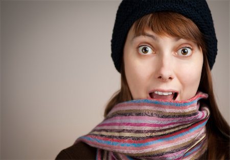 happy surprised beautiful young woman in winter clothes Fotografie stock - Microstock e Abbonamento, Codice: 400-04323525