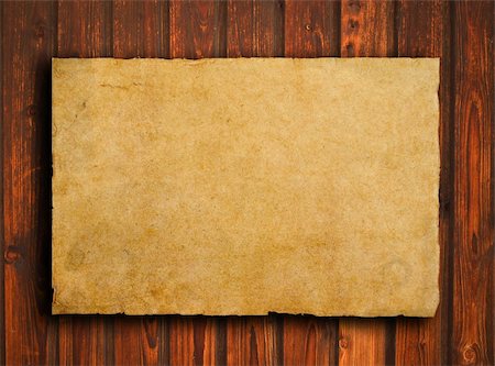 scrolled up paper - old paper on brown wood texture with natural patterns Stock Photo - Budget Royalty-Free & Subscription, Code: 400-04323615