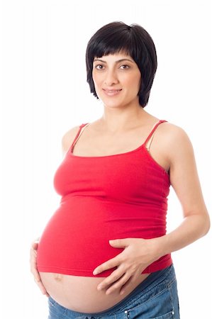 simsearch:400-06849973,k - Smiling pregnant woman isolated over white background Stock Photo - Budget Royalty-Free & Subscription, Code: 400-04323870