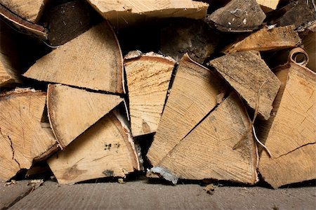 simsearch:693-05794394,k - Stack of chopped firewood prepared for burning. End view. Stock Photo - Budget Royalty-Free & Subscription, Code: 400-04334181