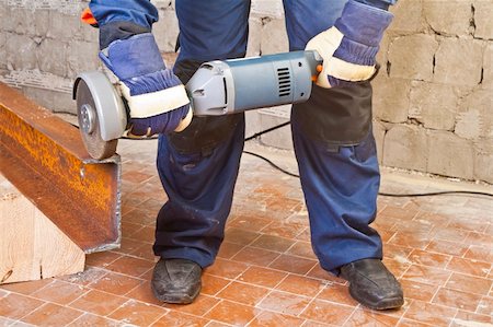 simsearch:400-04856931,k - A man working with grinder, close up on tool, hands and sparks, real situation picture Photographie de stock - Aubaine LD & Abonnement, Code: 400-04334206