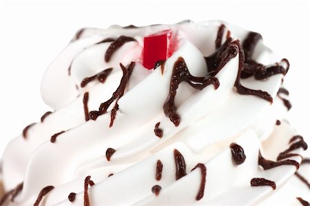 simsearch:400-04815679,k - Macro view of whipped cream with chocolate icing isolated over white Foto de stock - Super Valor sin royalties y Suscripción, Código: 400-04334202
