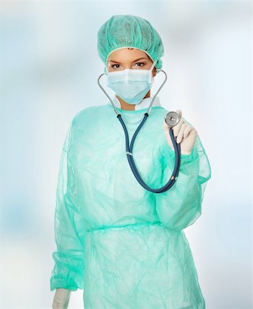 doctor with cap and mask - Female surgeon with sthetoscope. Stock Photo - Budget Royalty-Free & Subscription, Code: 400-04334599