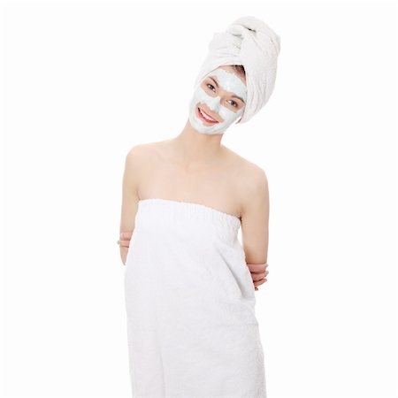 simsearch:400-06131065,k - Cosmetics mask of clay on the beautiful young female face , isolated on white Stockbilder - Microstock & Abonnement, Bildnummer: 400-04334689