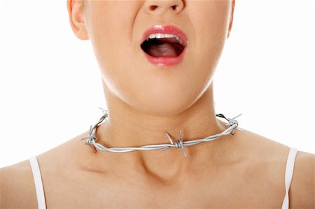 Throat pain concept. Young woman with barbed wire around her throat. Isolated on white Photographie de stock - Aubaine LD & Abonnement, Code: 400-04335062