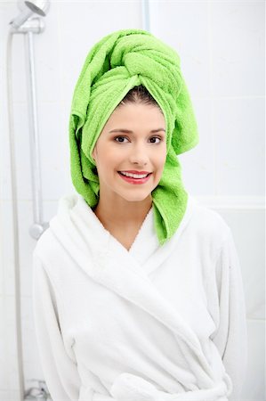 Happy young brunette after bath or shower Stock Photo - Budget Royalty-Free & Subscription, Code: 400-04336111