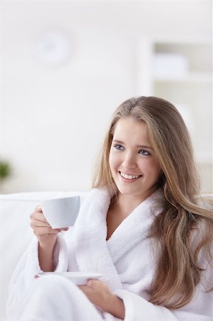 Cute girl in a bathrobe with a cup Stock Photo - Budget Royalty-Free & Subscription, Code: 400-04336456