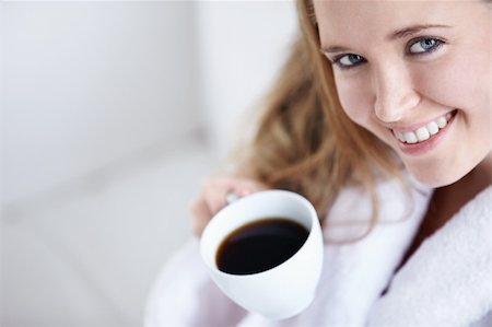 Young girl with a cup of coffee close up Stock Photo - Budget Royalty-Free & Subscription, Code: 400-04336462