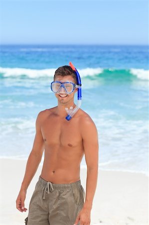 smile as mask for boy - Man with his mask at the beach Stock Photo - Budget Royalty-Free & Subscription, Code: 400-04336900