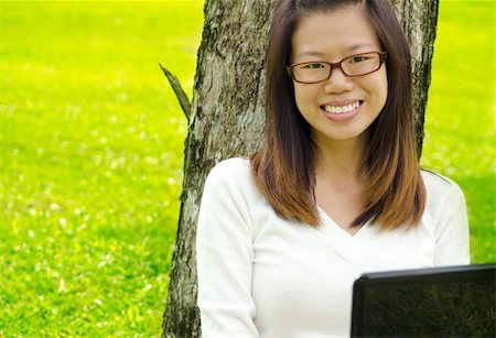 simsearch:6109-06003526,k - Asian Student Using Laptop Outside School Campus Stock Photo - Budget Royalty-Free & Subscription, Code: 400-04337216