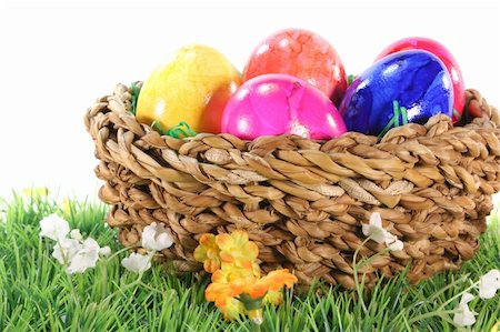 Easter basket with colorful Easter eggs on a green meadow Stock Photo - Budget Royalty-Free & Subscription, Code: 400-04337933