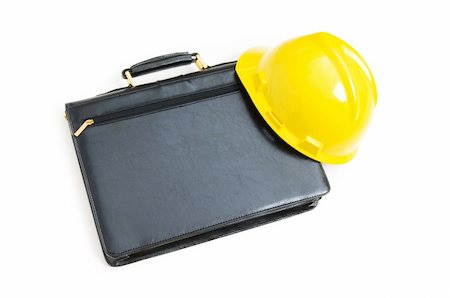 simsearch:400-08572683,k - Construction concept - case and hard hat isolated on white Stock Photo - Budget Royalty-Free & Subscription, Code: 400-04338107