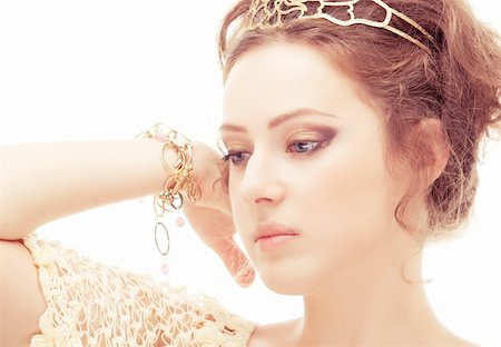 diadème - Goddess in a diadem and bracelets of gold, isolated on white background. Stock Photo - Budget Royalty-Free & Subscription, Code: 400-04338143