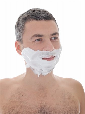 simsearch:400-04594366,k - Young handsome male  shaving face beard . isolated on white background Photographie de stock - Aubaine LD & Abonnement, Code: 400-04339045