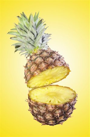 simsearch:400-04650758,k - fresh tasty pineapple over yellow background Stock Photo - Budget Royalty-Free & Subscription, Code: 400-04339243