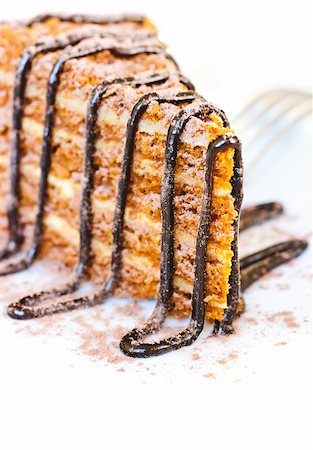 Cake with chocolate icing and chocolate decorations. Fotografie stock - Microstock e Abbonamento, Codice: 400-04339261