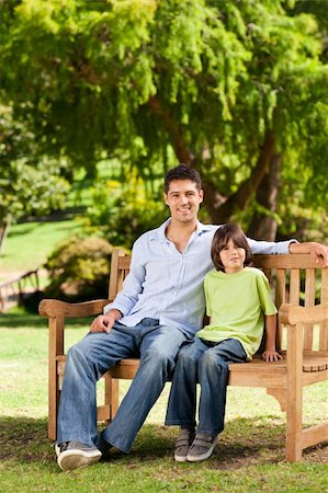 portrait of family on park bench - Father with his son on the bench Stock Photo - Budget Royalty-Free & Subscription, Code: 400-04339558