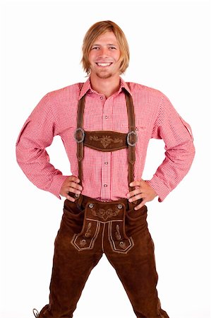 Happy proud man with oktoberfest leather trousers (lederhose) . Isolated on white background. Stock Photo - Budget Royalty-Free & Subscription, Code: 400-04339803