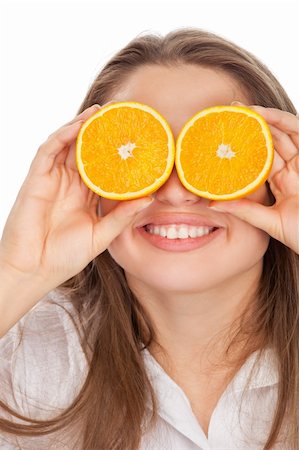 Portrait of blond and cute girl with orange Stockbilder - Microstock & Abonnement, Bildnummer: 400-04330090