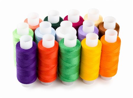 Spools multi-colored threads standing group isolated on a white background Stock Photo - Budget Royalty-Free & Subscription, Code: 400-04330155