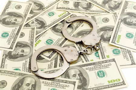 simsearch:640-02656413,k - Handcuffs on money background, business security concept Foto de stock - Super Valor sin royalties y Suscripción, Código: 400-04330184