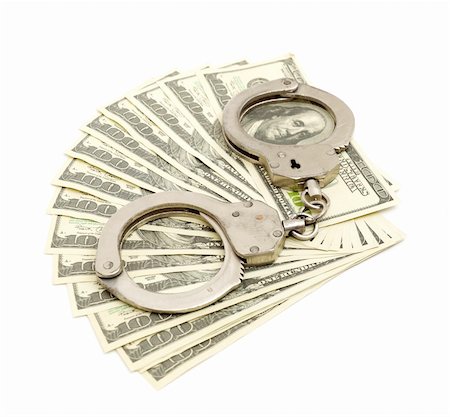 Handcuffs on money background, business security concept Stock Photo - Budget Royalty-Free & Subscription, Code: 400-04330183