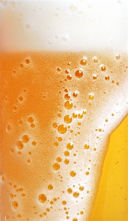 frothy head - close up of beer with foam Foto de stock - Super Valor sin royalties y Suscripción, Código: 400-04330785