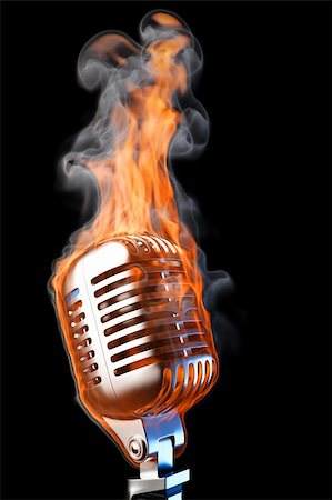 old mic in flames. isolated on black. Stock Photo - Budget Royalty-Free & Subscription, Code: 400-04331053
