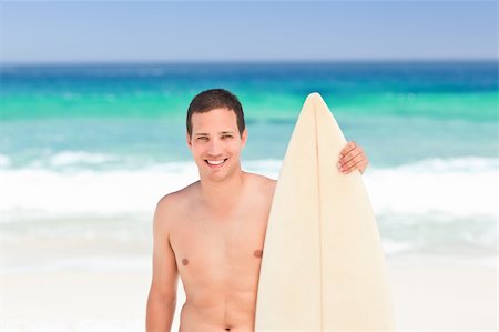 simsearch:400-05319489,k - Man with his surfboard Stock Photo - Budget Royalty-Free & Subscription, Code: 400-04331349