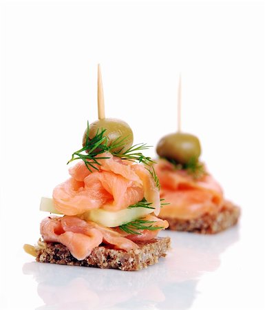 Delicious Appetizer Plate with Salmon and Olives Photographie de stock - Aubaine LD & Abonnement, Code: 400-04331487