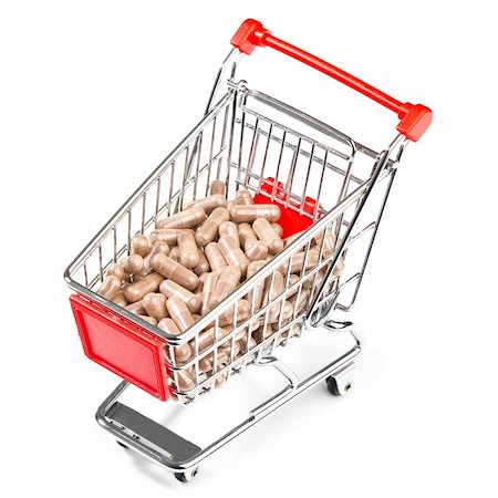 Carts on a white background filled with pills Stock Photo - Budget Royalty-Free & Subscription, Code: 400-04332384