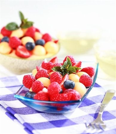 simsearch:400-04415230,k - Delicious fresh berries served in bowl as dessert Photographie de stock - Aubaine LD & Abonnement, Code: 400-04332537