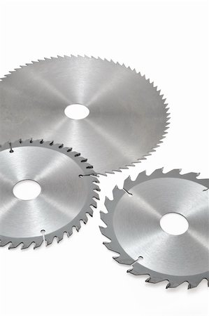 simsearch:400-04333451,k - Circular saw blades for wood isolated on white Photographie de stock - Aubaine LD & Abonnement, Code: 400-04332744