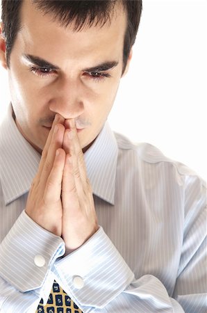simsearch:400-04631810,k - Isolated young business man pray Stock Photo - Budget Royalty-Free & Subscription, Code: 400-04332849